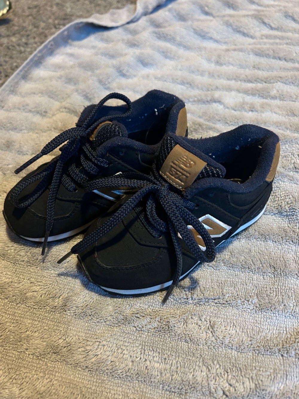 New Balance Kids Black and Tan Athletic Sneakers